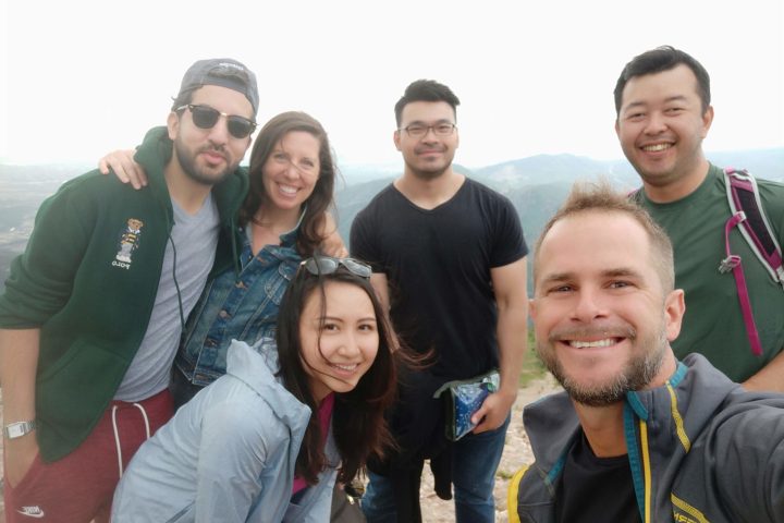 a group of people posing for a photo