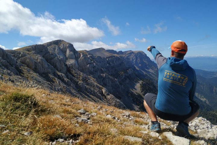 a man standing on top of a mountain