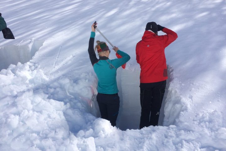a person is standing in the snow