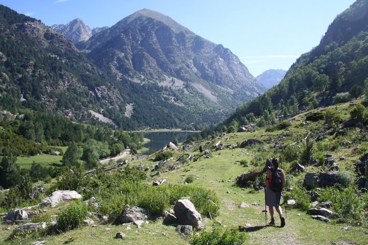 a group of people on a rocky hill